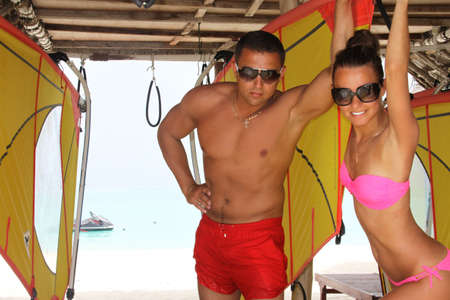 Happy couple on the beach of seaの写真素材