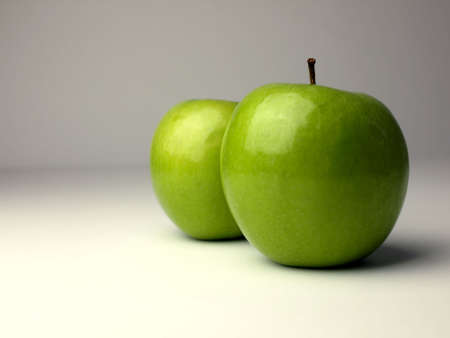 Two green applesの写真素材