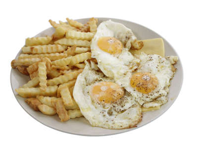 Fried eggs with French friesの写真素材