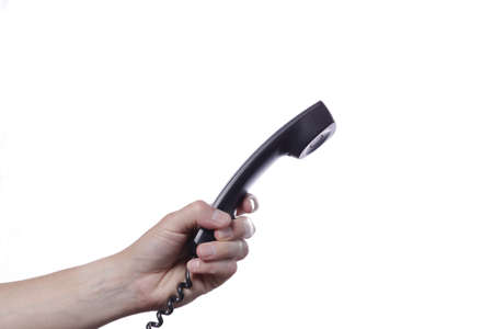 Hand with a telephone recieverの写真素材