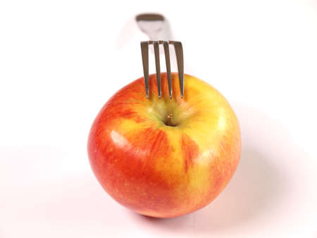 Fresh apple with fork      の写真素材