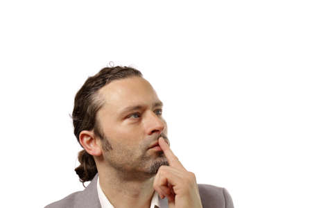 Young businessman thinkingの写真素材