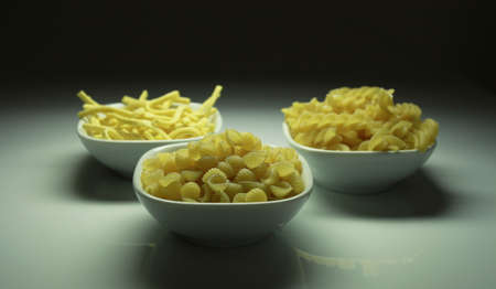 Pasta in white bowlsの写真素材