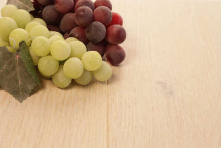 Grapes on a wooden backgroundの写真素材