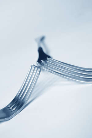 Steel forks in modern blueの写真素材