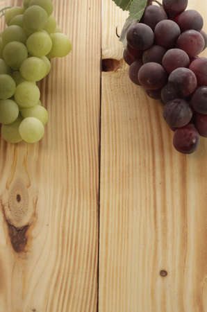 Grapes with a wooden backgroundの写真素材