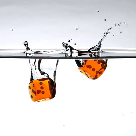 Poker dices in red orangeの写真素材