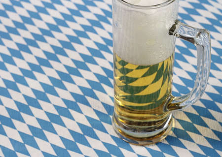 Glass of beer with the Bavarian flag