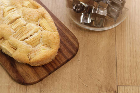 Apple cake on a wooden backgroundの写真素材