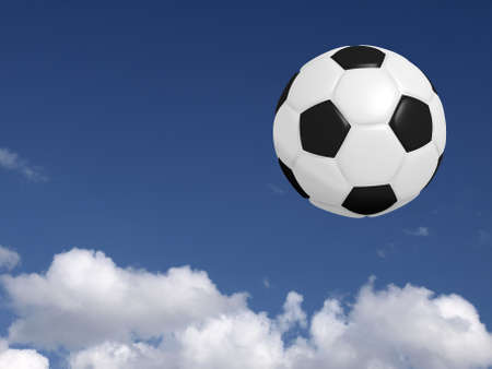 Soccer ball on a summer skyの写真素材