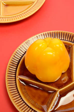 Yellow Paprika on a plateの写真素材