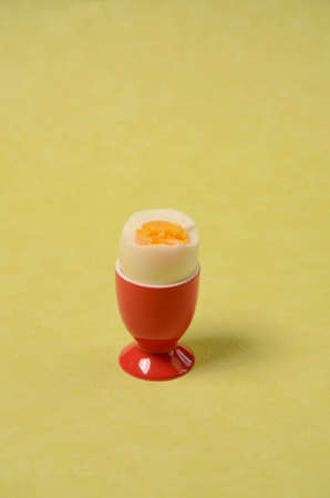 Boiled egg on a green backgroundの写真素材