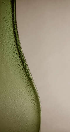 Water droplets on a bottle of wineの写真素材