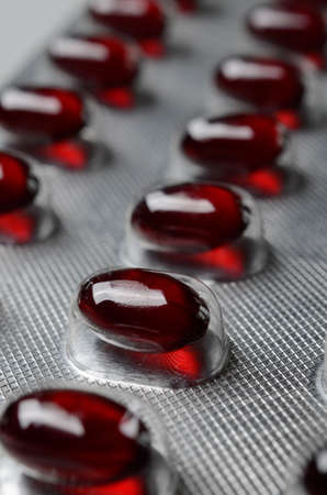 Closeup of red capsules