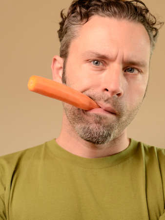 Man with a carrotの写真素材