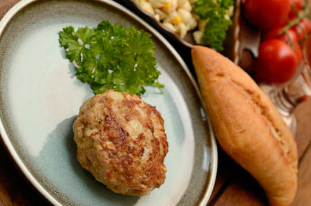 Burger with parsley and baguetteの写真素材