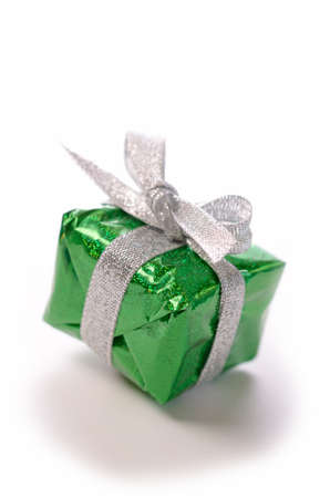 Green gift box with a bowの写真素材