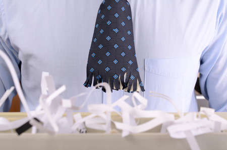business man with shredded tieの写真素材