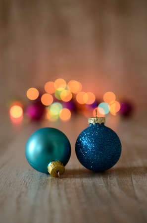 Christmas baubles on a rustic wooden の写真素材