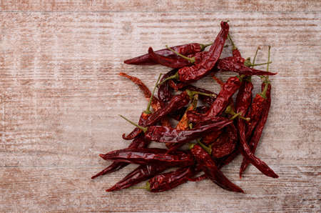 Dried chilies on a rustic wooden