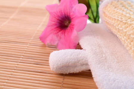 Bath additive with towel and flower decorationの写真素材