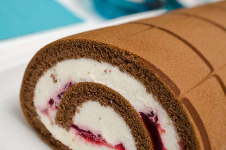 Sweet cherry cake on a white plate