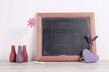 Chalkboard with a heart shape and lavenderの写真素材