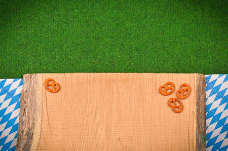 Oktoberfest background with the Bavarian flag and pretzelの写真素材