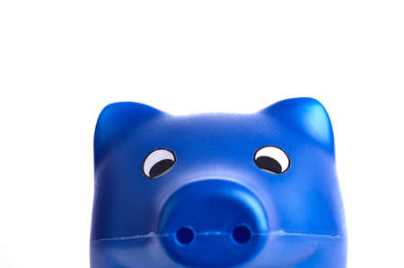 Close up of a blue piggy bank on whiteの写真素材