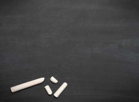 Blank blackboard with chalk and space for text or image