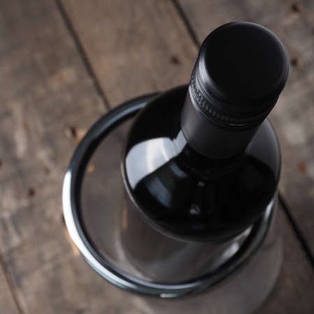 Bottle of wine with view from above, selective focus on topの写真素材