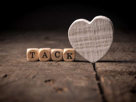 Wooden dices with the Swedish word of Thank youの写真素材