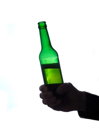 Man with a bottle of beer on a white backgroundの写真素材