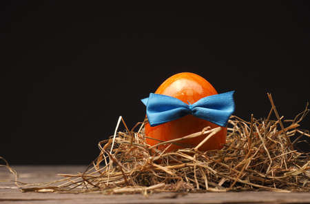 Easter background on an old rustic wooden tableの写真素材