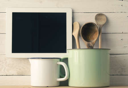 Home kitchen still life, old vintage wooden cooking spoons on white barn wood backgroundの写真素材