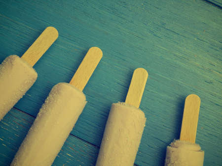 Strawberry ice cream on a blue wooden backgroundの写真素材