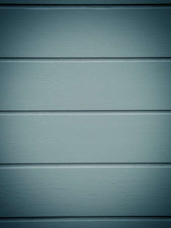 Grey wooden background with space for text or image, vintage or retro stylizedの写真素材