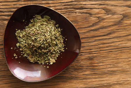 Cooking ingredients, herbs on a wooden rustic table