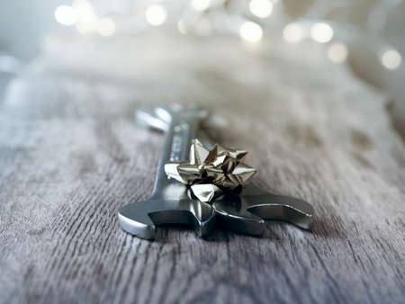 Christmas background with industrial tools on a rustic wooden tableの写真素材