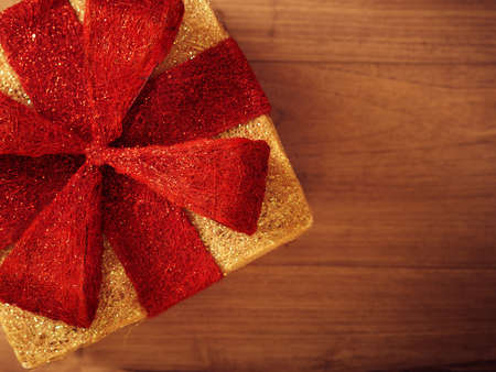 Christmas background with a big gift box, view from aboveの写真素材