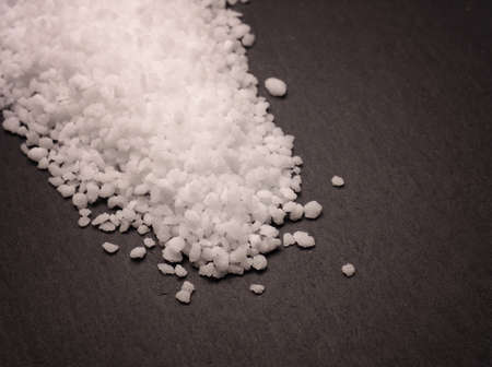 Organic salt on a dark slate board