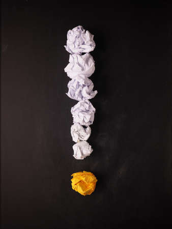 Crumpled paper on a blackboard as symbol of new great ideasの写真素材