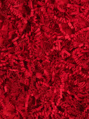 Shredded red paper using as abstract background textureの写真素材