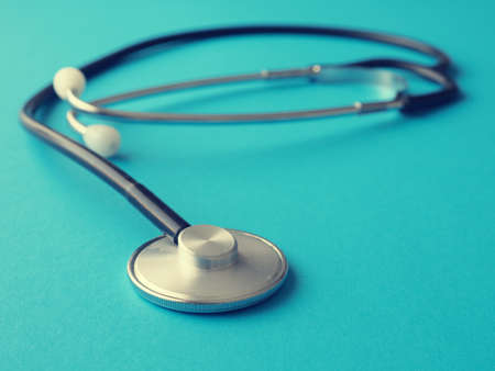 Stethoscope on a blue background, heath care or medical concept backgroundの写真素材