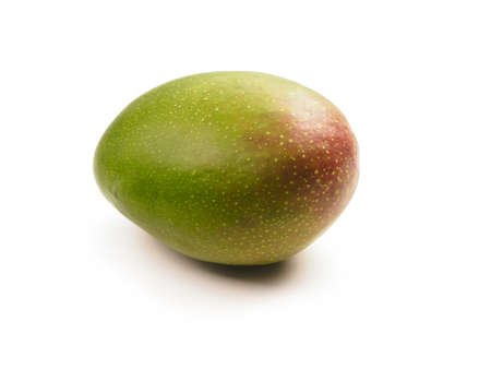 Fresh organic mango fruit on a white background, healthy eatingの写真素材
