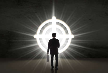 Businessman with a bright open target door, conceptual success imageの写真素材