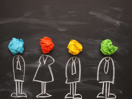 Teamwork, four handdrawn business character with crumpled paper, strong togetherの写真素材