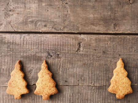 Tasty homemade cookies on a rustic wooden table, Seasonal or food concept backgroundの写真素材