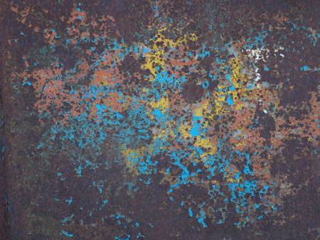 Rusty surface with exfoliated paint using as backgroundの写真素材