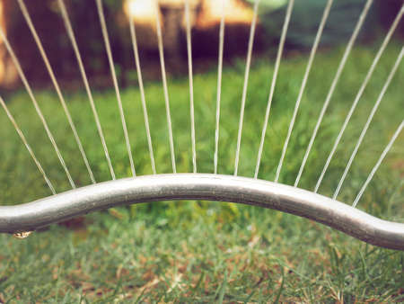 Close up of a lawn sprinkler on the grass の写真素材